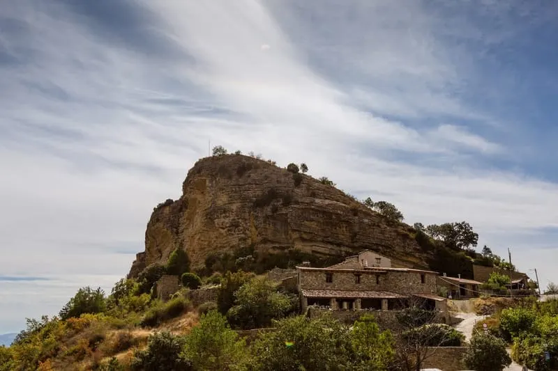 Santa Engràcia on its rocky outcrop, the houses stacked along the shoulder.